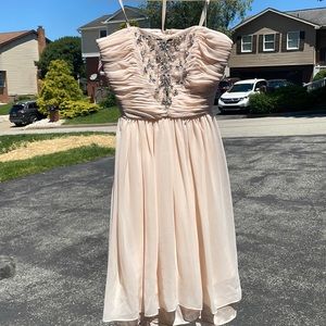 Super flowy, champagne dress.